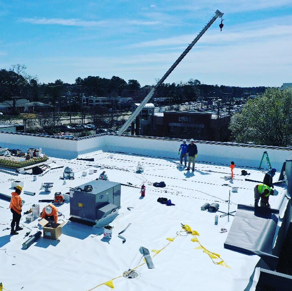 Commercial Roofing crew prepping the site